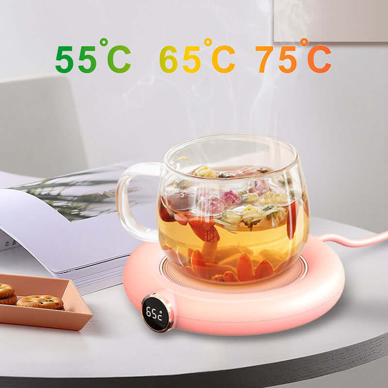 USB cup warmer heating tea in a glass mug