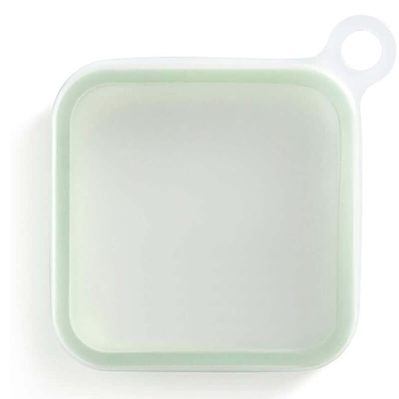 Square silicone lid with handle on a white background