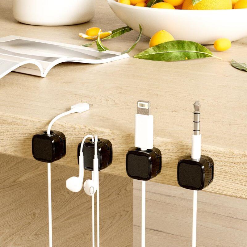 Magnetic cord organizers for USB and charging cables