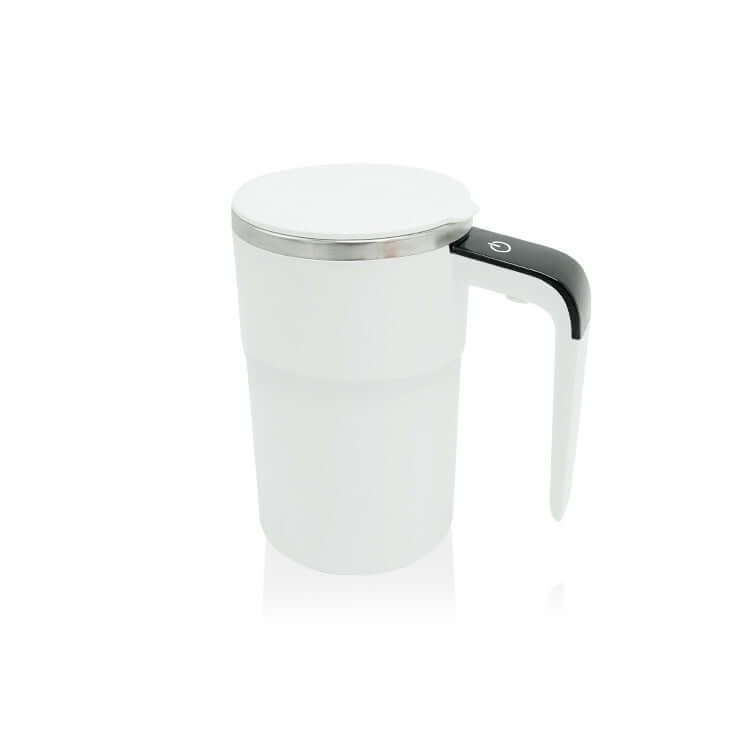 Elegant white self-stirring mug with stainless steel design on desk