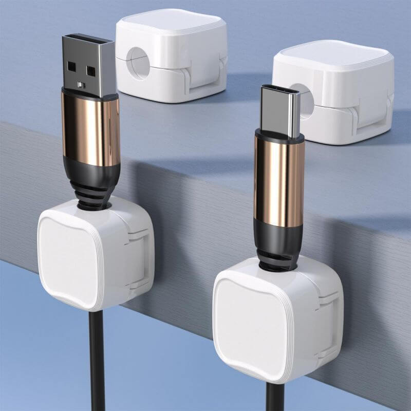 Wall-mounted black magnetic cable holders – no drilling