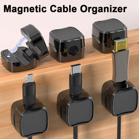 Magnetic cable organizer holding multiple cords on wooden desk