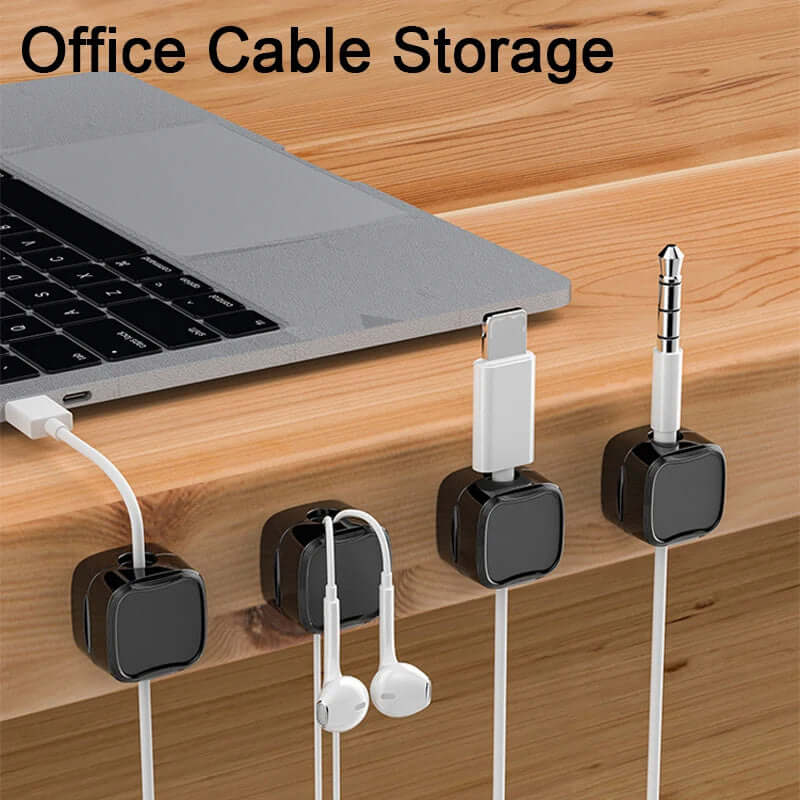 Black magnetic cable holders neatly placed on office desk