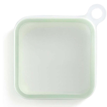 Square silicone lid with handle on a white background