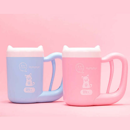 Two Pet Paw Cleaner Cup,  one blue and one pink, on a pink background.