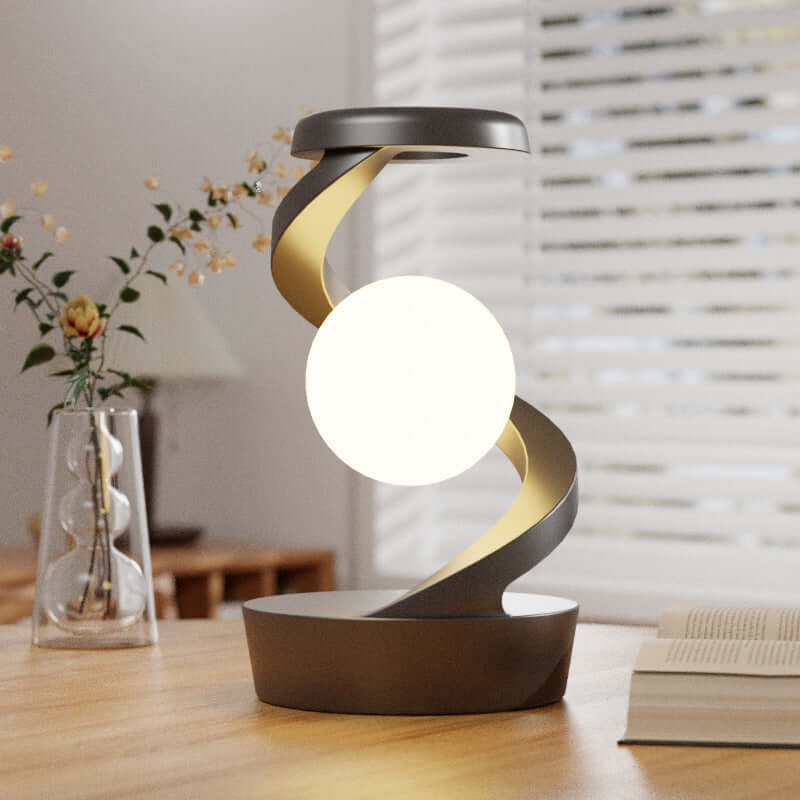 smart moon lamp charging phone wirelessly on nightstand