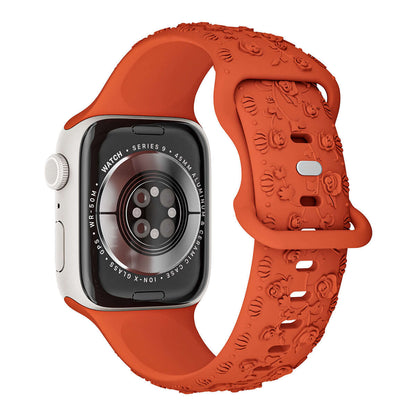 Apple Watch Band in vibrant orange with floral silicone strap design, showcasing comfort and elegance for women.